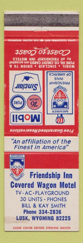 Matchbook Cover - Friendship Inn Covered Wagon Motel Lusk WY WEAR