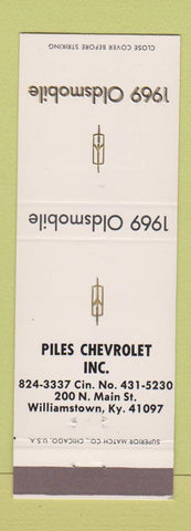 Matchbook Cover - 1969 Oldsmobile Piles Chevrolet Williamstown KY