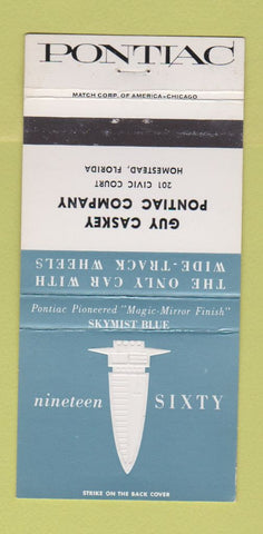 Matchbook Cover - 1960 Pontiac Caskey Homestead FL Skymist Blue WEAR 30 Strike