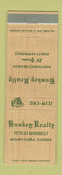 Matchbook Cover - Huskey Real Estate Mount Dora FL WEAR