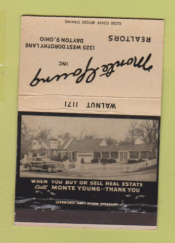 Matchbook Cover - Monte Young Real Estate Dayton ON WORN 40 Strike