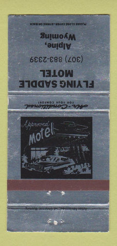 Matchbook Cover - Flying Saddle Motel Alpine WY SILVER WEAR 30 Strike