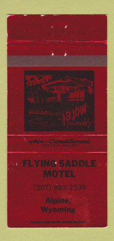 Matchbook Cover - Flying Saddle Motel Alpine WY 30 Strike