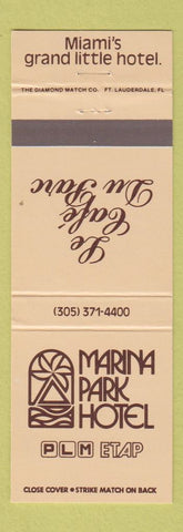 Matchbook Cover - Marina Park Hotel Le Cafe Du Parc Miami FL