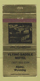 Matchbook Cover - Flying Saddle Motel Alpine WY GOLD WEAR 30 Strike