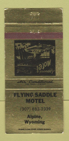 Matchbook Cover - Flying Saddle Motel Alpine WY GOLD WEAR 30 Strike