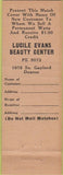 Matchbook Cover - Andre Hair Salon girlie Denver CO Lucile Evans