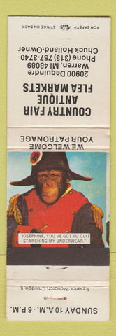 Matchbook Cover - County Fair Antique Flea Market Warren MI Napoleon Monkey