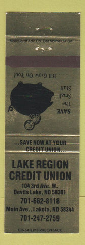 Matchbook Cover - Lake Region Credit Union Lakota ND piggy bank