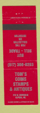 Matchbook Cover - Tom's Coins Stamps Antiques Alpena MI