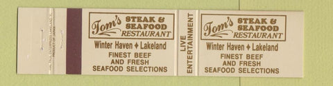 Matchbook Cover - Tom's Steak Seafood Winter Haven Lakeland FL 12 Strike