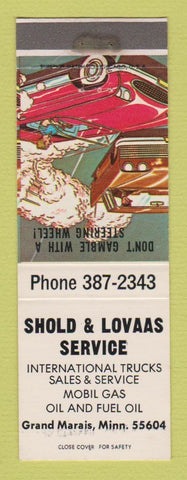 Matchbook Cover - Mobil gas Grand Marais MN International Harvester Trucks WEAR